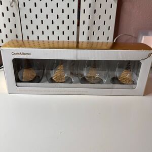 Crate & Barrel boxed set of 4 stemless wine glasses featuring a holiday tree des